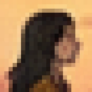 Extreme wide: Mira’s face, enlarged from a 22 px square area without smoothing, so the real pixel count is visible.